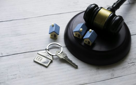 Concept of real estate auction, legal system and property division after divorce.